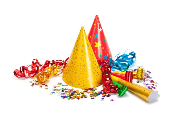 Party caps, confetti and streamers — Stock Photo, Image
