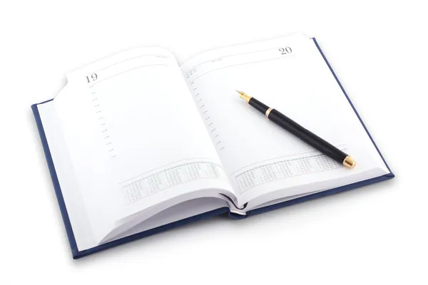 Agenda e caneta sobre fundo branco — Fotografia de Stock