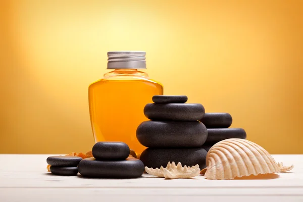 Spa minerals - essential oil and massage stones — Stock Photo, Image