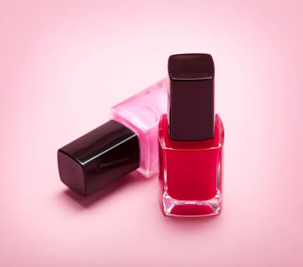 Esmalte de uñas - rosa y rojo — Foto de Stock