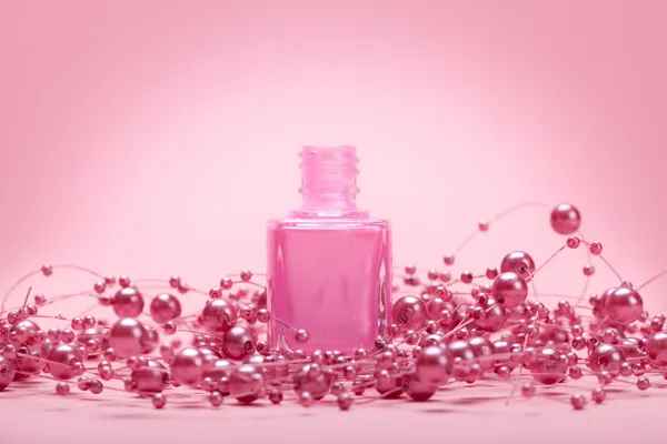 Nail polish on pink background — Stock Photo, Image