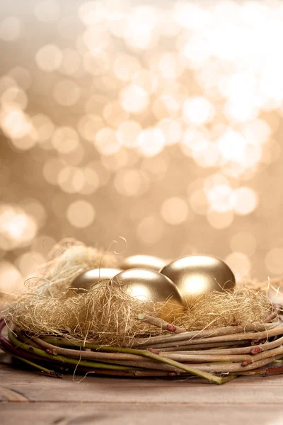 Golden nest eggs — Stock Photo, Image