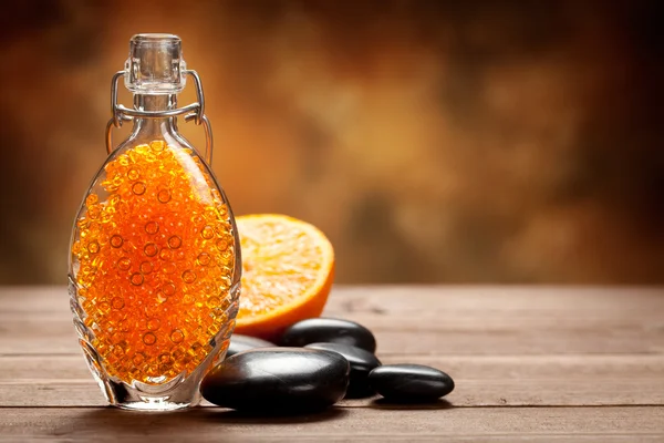 Bagno all'arancia sale e pietre da massaggio — Foto Stock