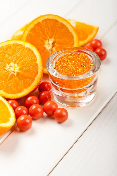 Orange bath salt - fruits and aromatherapy minerals — Stock Photo, Image