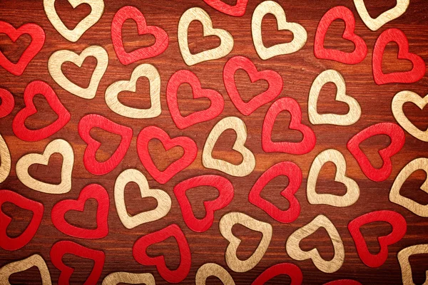 Dřevěné srdce - valentine pozadí — Stock fotografie
