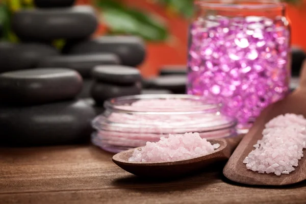 Spa treatment - pink minerals and black stones — Stock Photo, Image