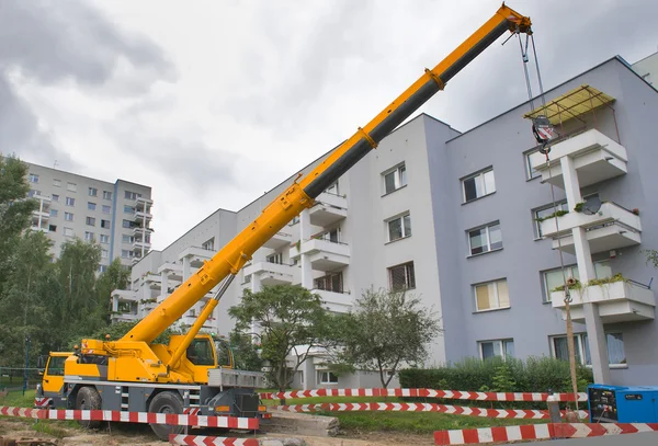 Yellow automobile crane with risen telescopic boom — Stock Image Yellow automobile crane with risen telescopic boom Stock Photo