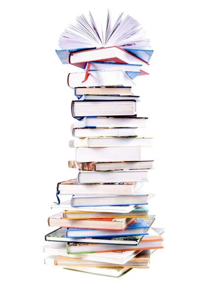 Pilha de livros coloridos isolados sobre fundo branco — Fotografia de Stock