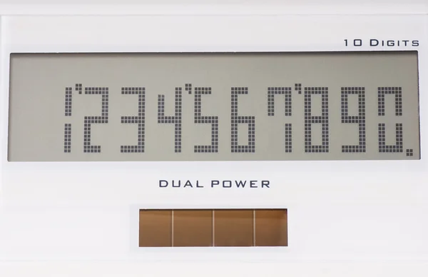 A fehér számológép, powered napelemes megjelenítése — Stock Fotó
