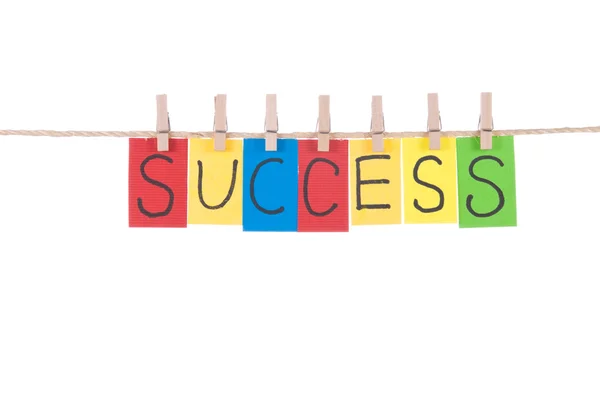 Success, words hang by wooden peg — Stock Photo, Image