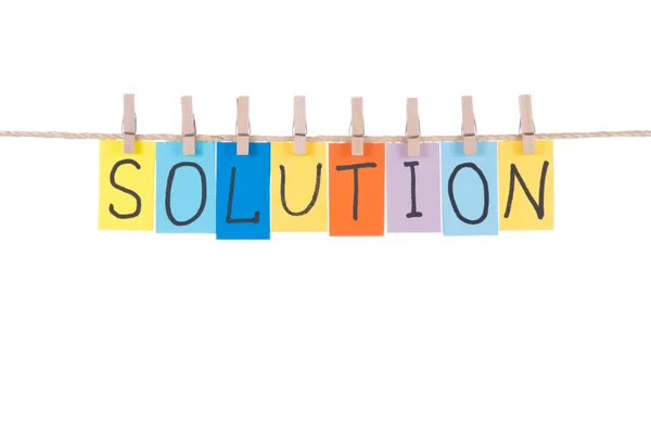 Solution, words hang by wooden peg — Stock Photo, Image