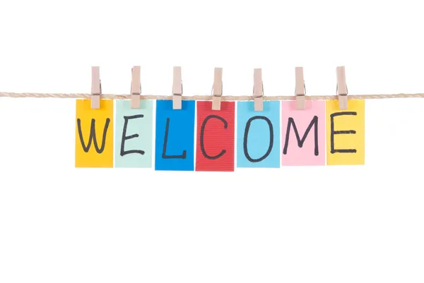 Welcome,words hang by wooden peg — Stock Photo, Image