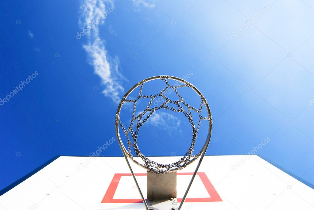 Basketball stand under blue sky