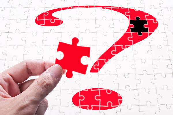 Question mark, hand and puzzle game