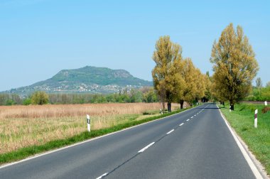 Main road leads near the extinct volcano clipart