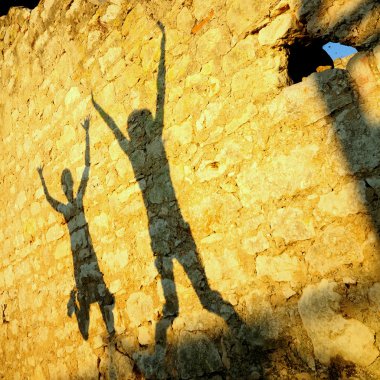 Two Girls playing catch with his shadow clipart