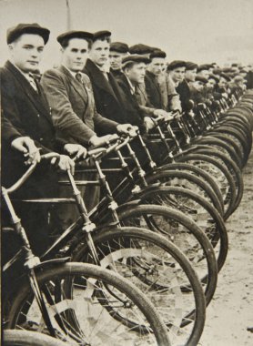 Men on bicycles, old photograph clipart