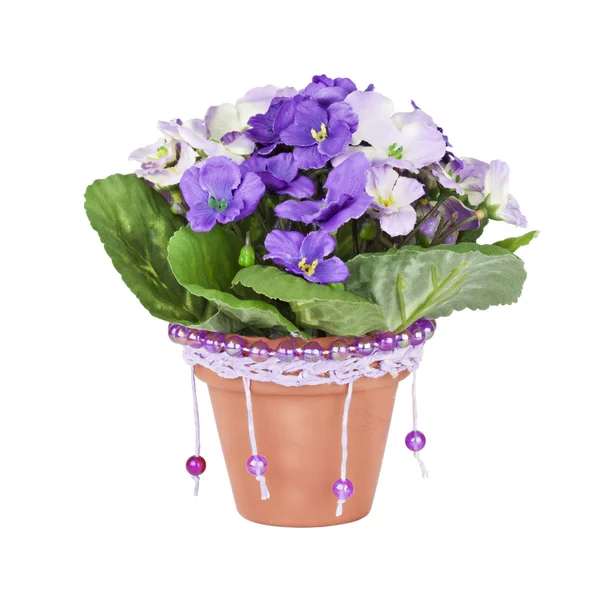 Artificial violet in ceramic pots, decorated with beads — Stock Photo, Image