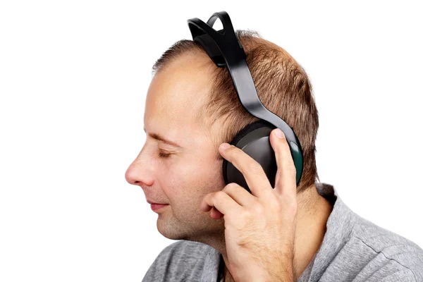 Young man in headphones — Stock Photo, Image