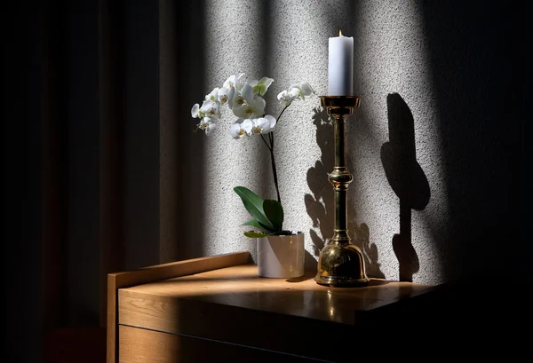 stock image Candle, flowers and shadows