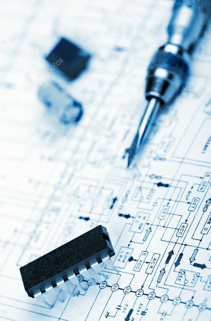 Electronic components on a schematic diagram background