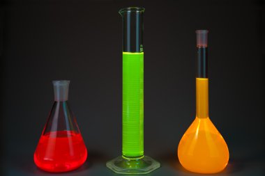 Fluorescence in flasks clipart