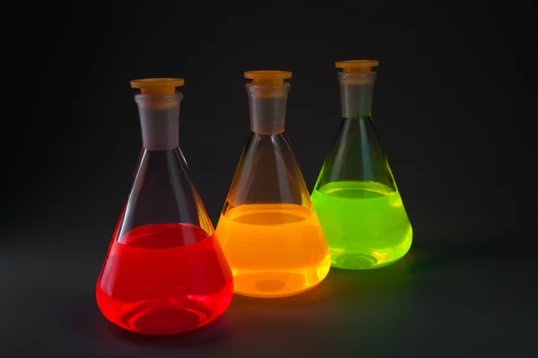 Fluorescence in flasks diagonally — Stock Photo, Image