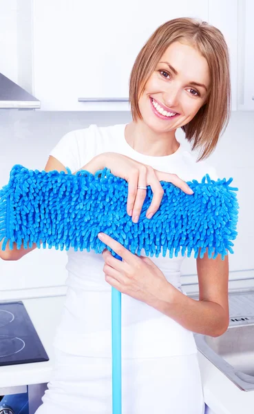 Housewife with a mop — Stock Photo, Image