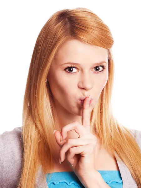 Mulher com o dedo perto dos lábios — Fotografia de Stock