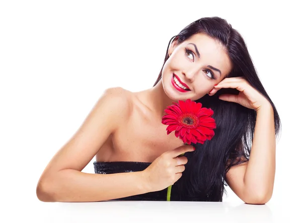 Kvinna med en blomma — Stockfoto