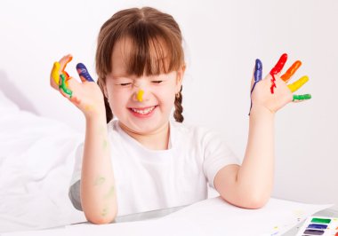 Girl painting with watercolor