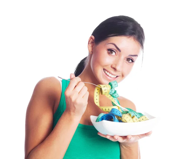 Vrouw eten meten tapes — Stockfoto