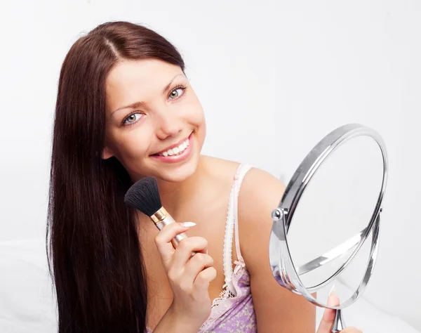 Woman with a mirror — Stock Photo, Image