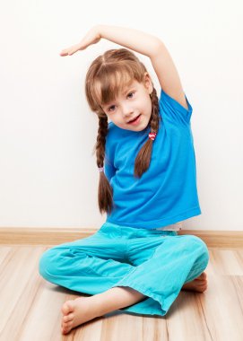 Girl stretching the muscles clipart