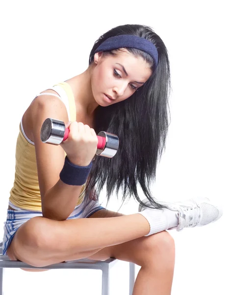 Woman with a dumbbell — Stock Photo, Image