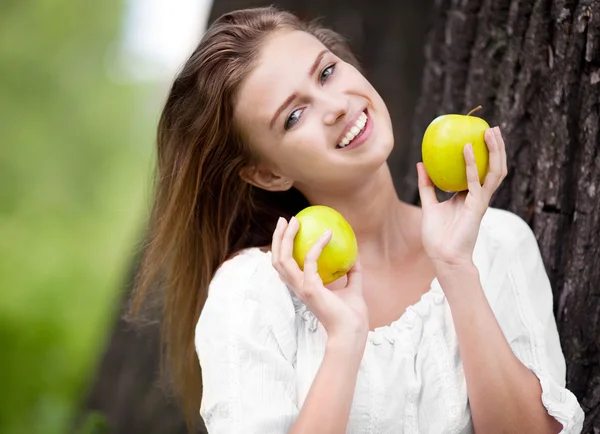 Woman with apples — Stock Photo, Image