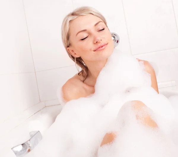 Woman taking a bath — Stock Photo, Image