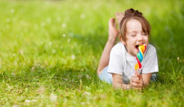 Girl with a lollipop clipart