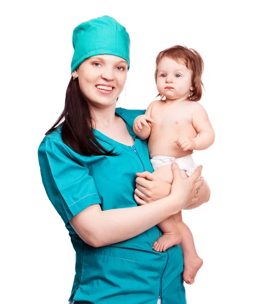 Хирург с ребенком — стоковое фото