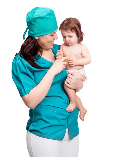 Хирург с ребенком — стоковое фото