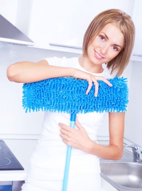 Housewife with a mop clipart