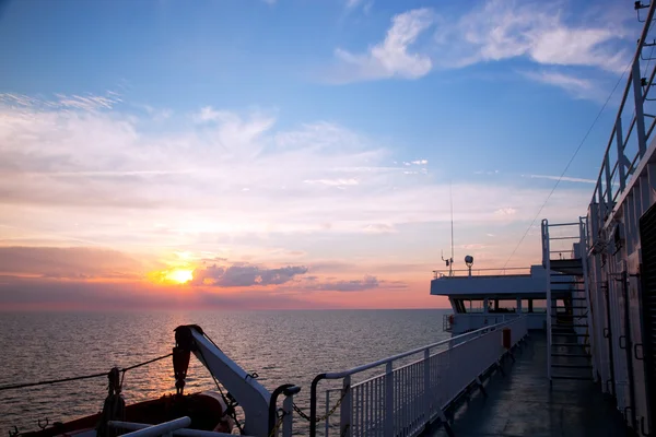 Ship deck view, ocean at sunset — Stock Photo, Image