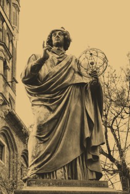 The statue of famous astronomer Nicholas Copernicus clipart