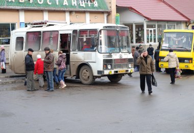 Old bus in city Mosciska, Ukraine. clipart