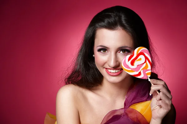 Mädchen mit einem Lollypop — Stockfoto
