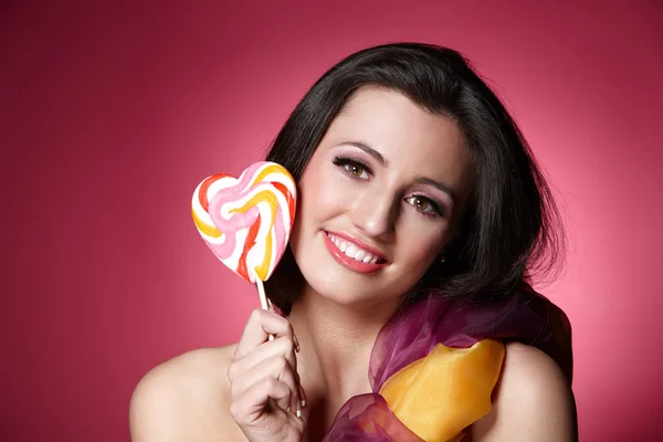 Girl with a lollypop — Stock Photo, Image