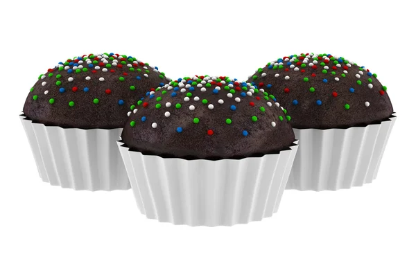 Três cupcakes de chocolate isolados em fundo de merda — Fotografia de Stock