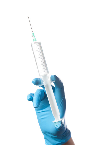 Hand in blue glove holding syringe isolated on white background