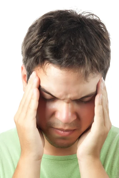 Jovem sofrendo de uma dor de cabeça isolada no fundo branco — Fotografia de Stock