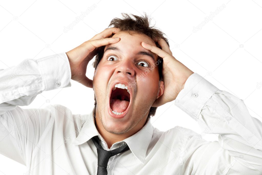 Young office worker mad by stress screaming isolated on white
